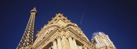 Low angle view of a building in front of a replica of the Eiffel Tower Paris Hotel Las Vegas Nevada USA Canvas Art - Panoramic Images (36 x 13)