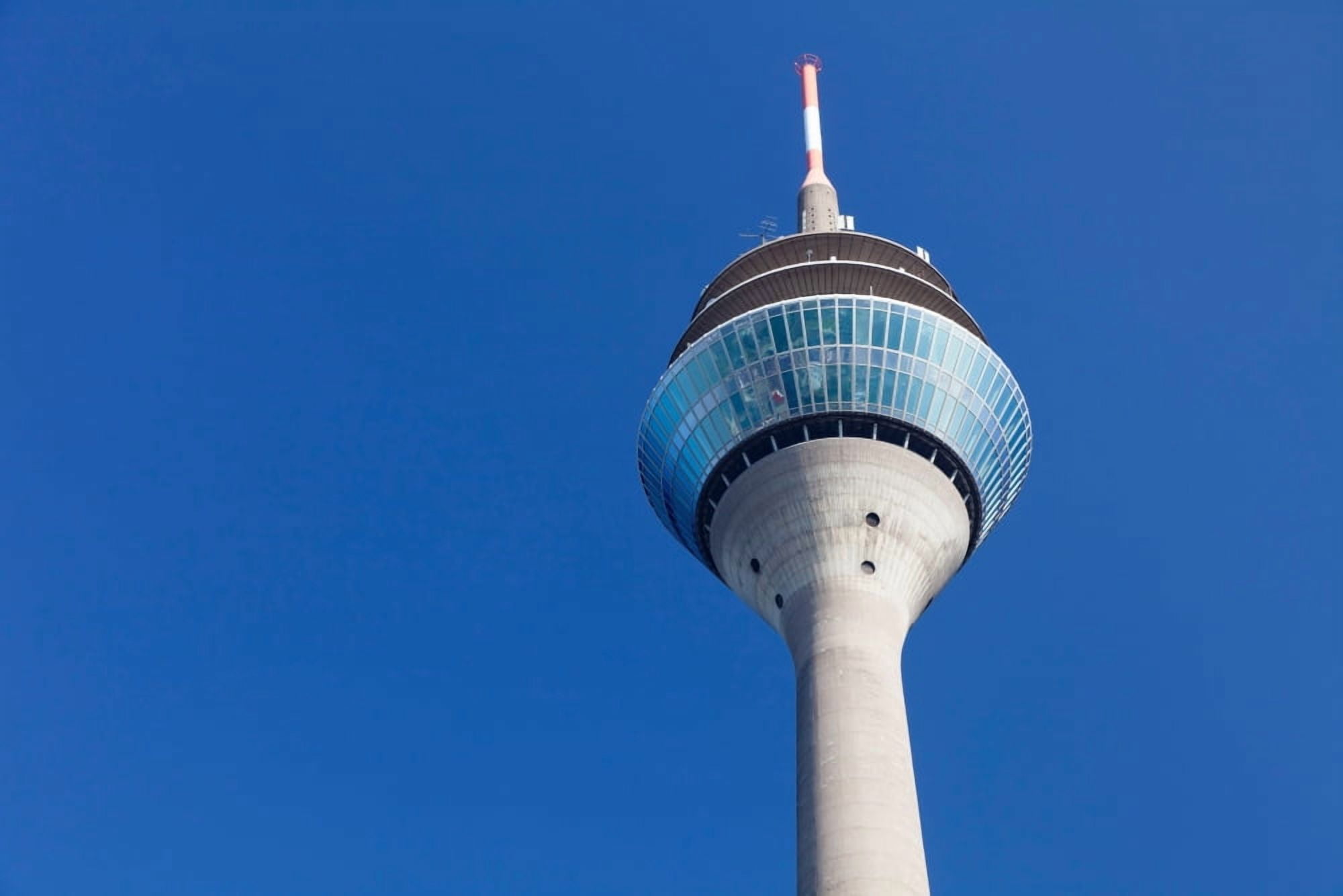 Low angle view of a communications tower Rheinturm Tower Dusseldorf North Rhine Westphalia Germany Canvas Art - Panoramic Images (27 x 9)