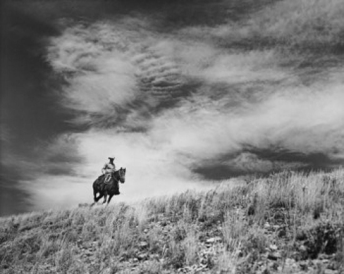 Low angle view of a cowboy riding on a horse Canvas Art - (18 x 24)