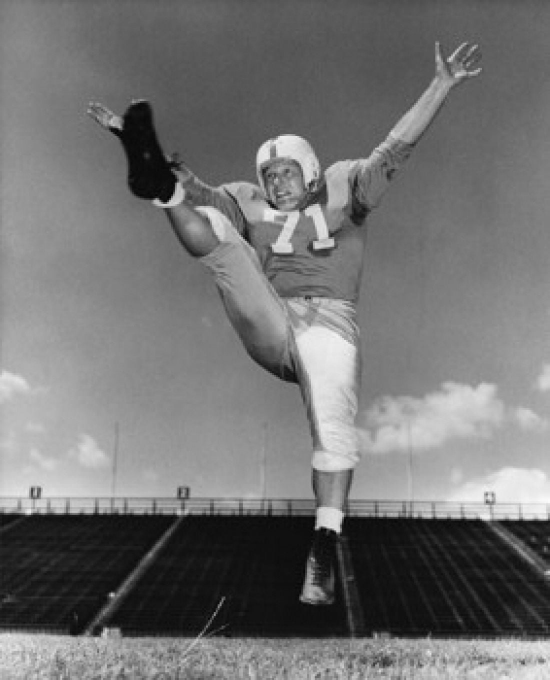 Low angle view of a football player kicking Canvas Art - (24 x 36)