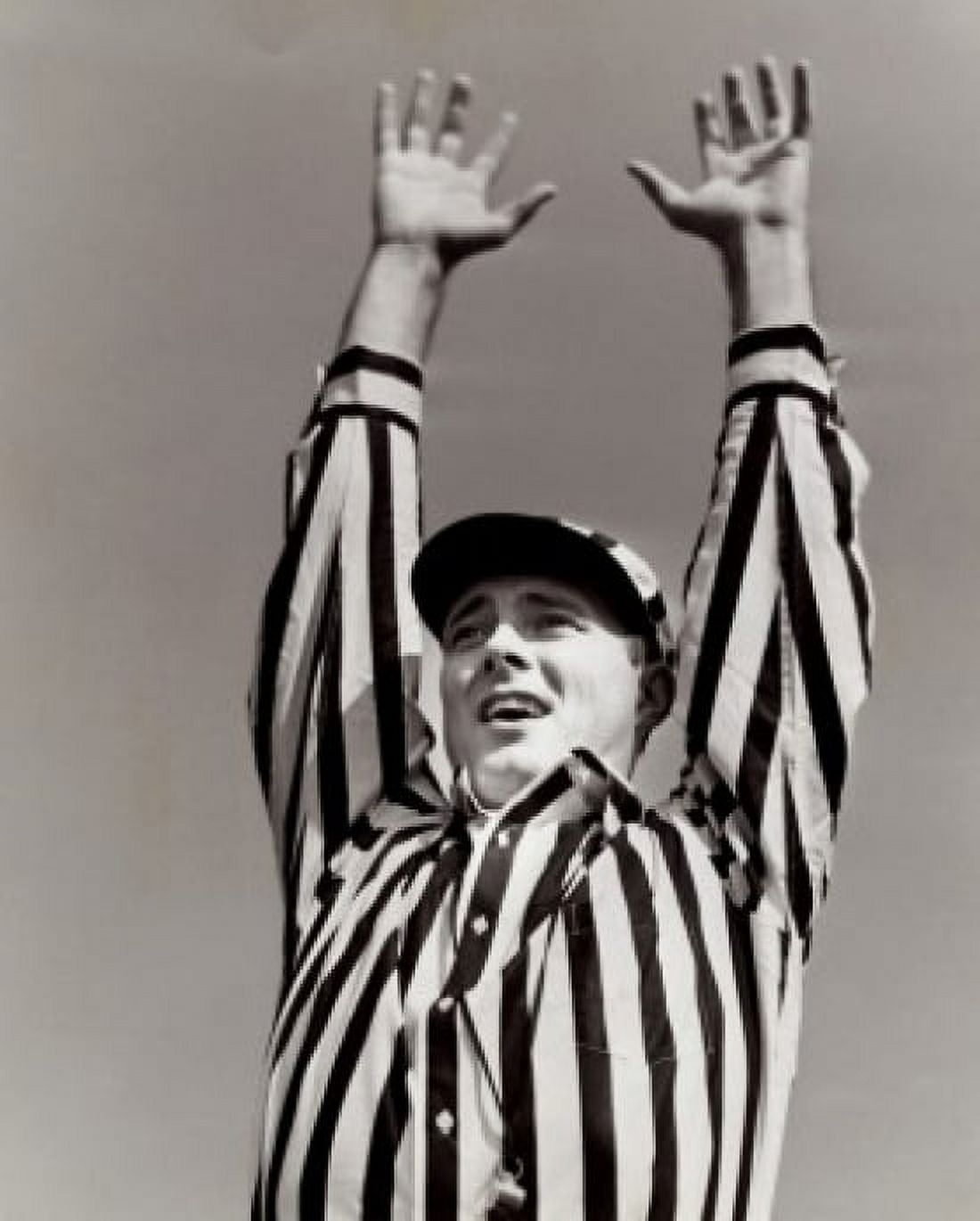 Low angle view of a football referee signaling a touchdown Canvas Art - (24 x 36)