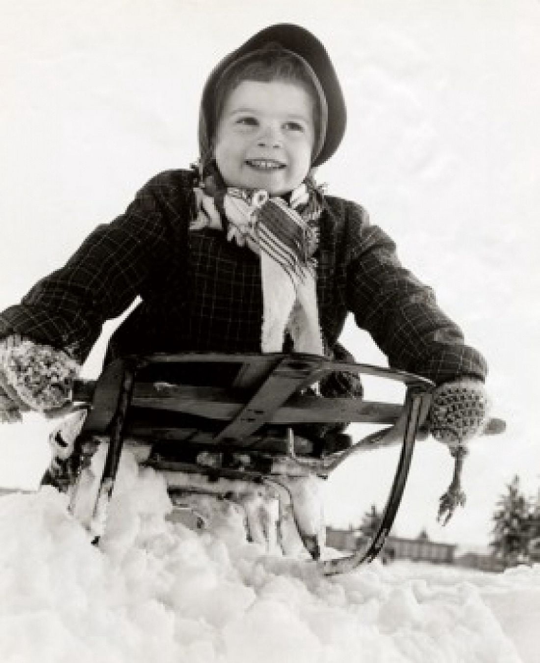 Low angle view of a girl on a sled Canvas Art - (24 x 36)