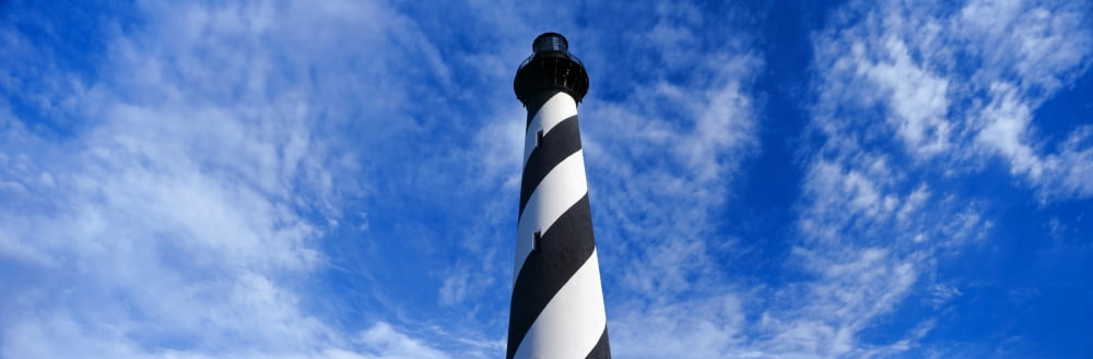 Low angle view of a lighthouse Cape Hatteras Lighthouse Outer Banks Buxton North Carolina USA Canvas Art - Panoramic Images (27 x 9)