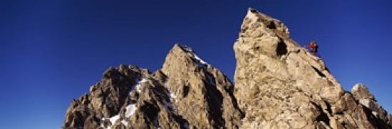 Low angle view of a man climbing up a mountain Rockchuck Peak Grand Teton National Park Wyoming USA Canvas Art - Panoramic Images (18 x 6)