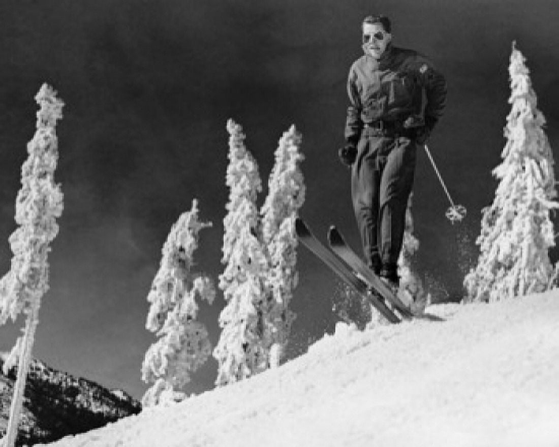 Low angle view of a mid adult man skiing on snow Canvas Art - (24 x 36)