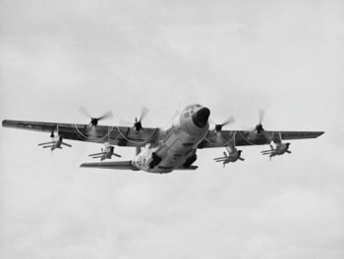 Low angle view of a military airplane in flight Canvas Art - (24 x 36)