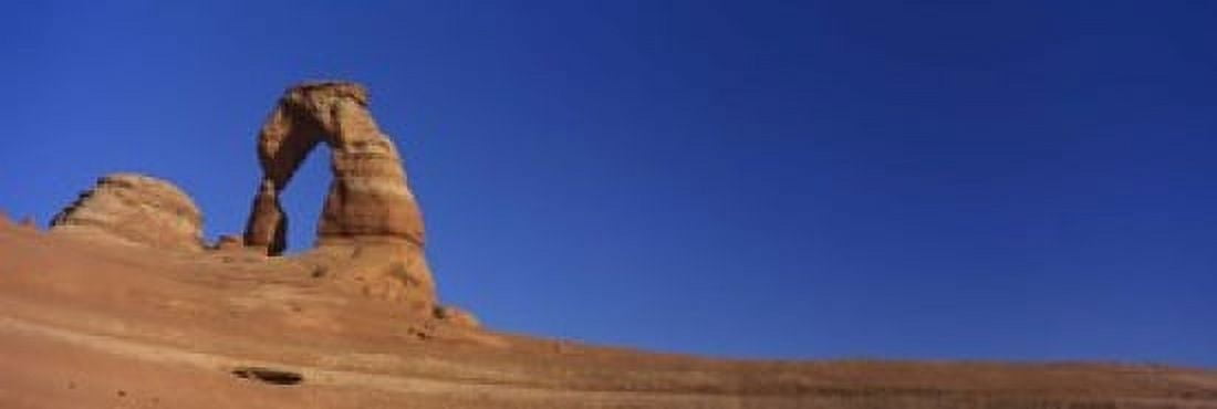 Low angle view of a natural arch Delicate arch Arches National Park Utah USA Canvas Art - Panoramic Images (18 x 6)