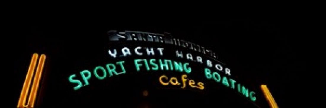 Low angle view of a neon signboard Santa Monica Pier Santa Monica Los Angeles County California USA Canvas Art - Panoramic Images (18 x 7)