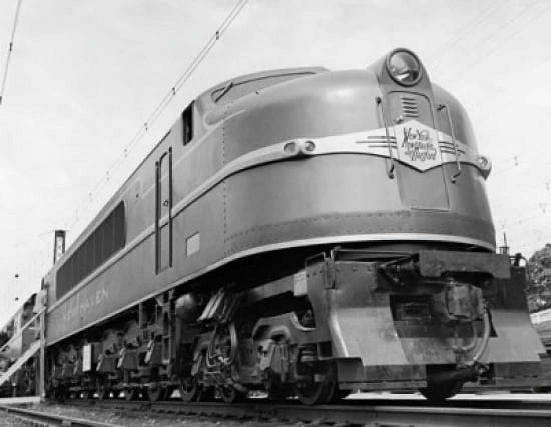 Low angle view of a passenger train on a railroad track Canvas Art - (24 x 36)