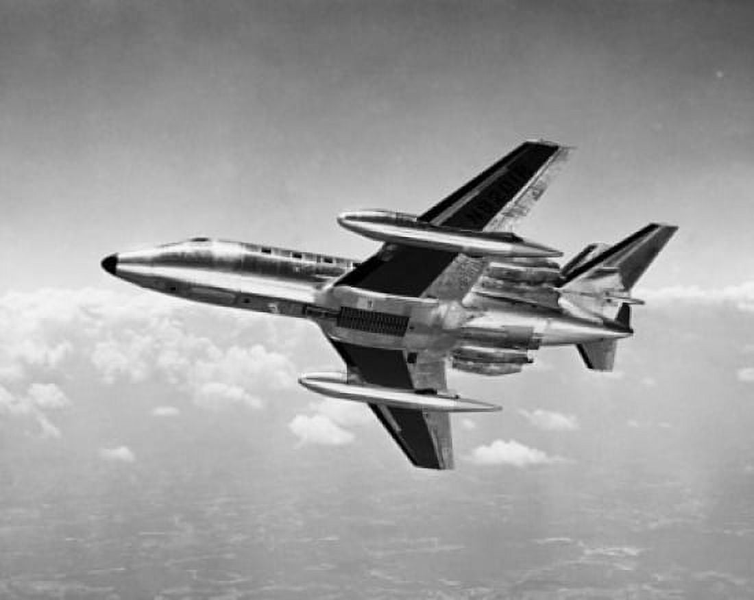 Low angle view of a plane in flight Canvas Art - (24 x 36)