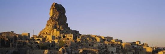 Low angle view of a rock formation in a village Cappadocia Turkey Canvas Art - Panoramic Images (36 x 12)