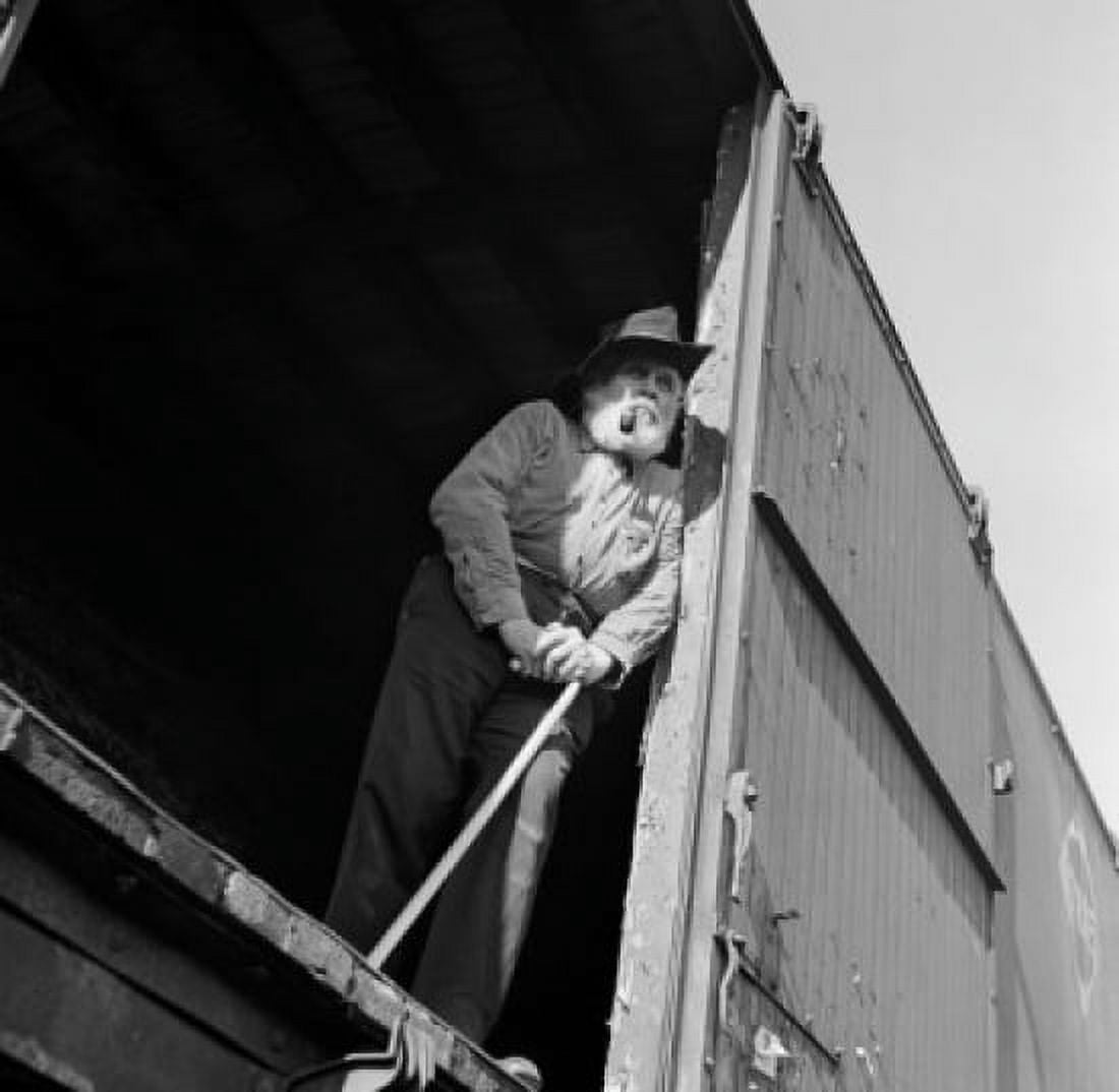 Low angle view of a senior man standing in a train car Canvas Art - (18 x 24)