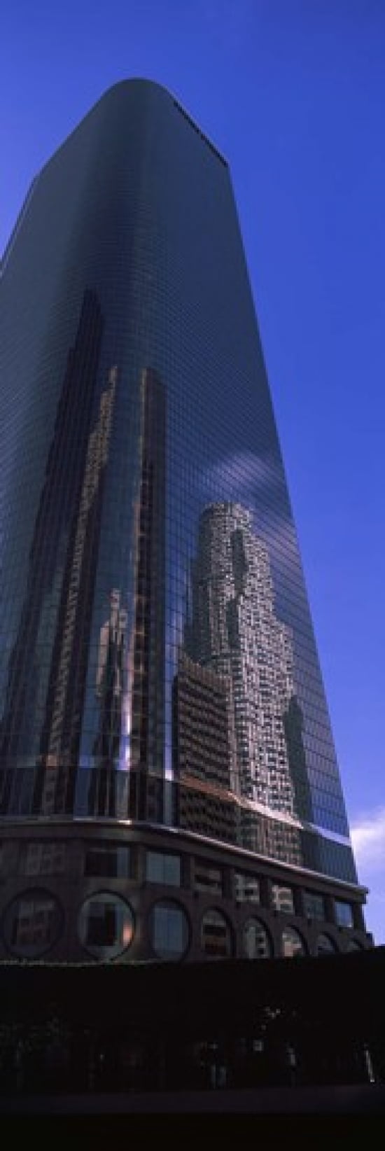 Low angle view of a skyscraper in a city City Of Los Angeles Los Angeles County California USA Canvas Art - Panoramic Images (36 x 12)