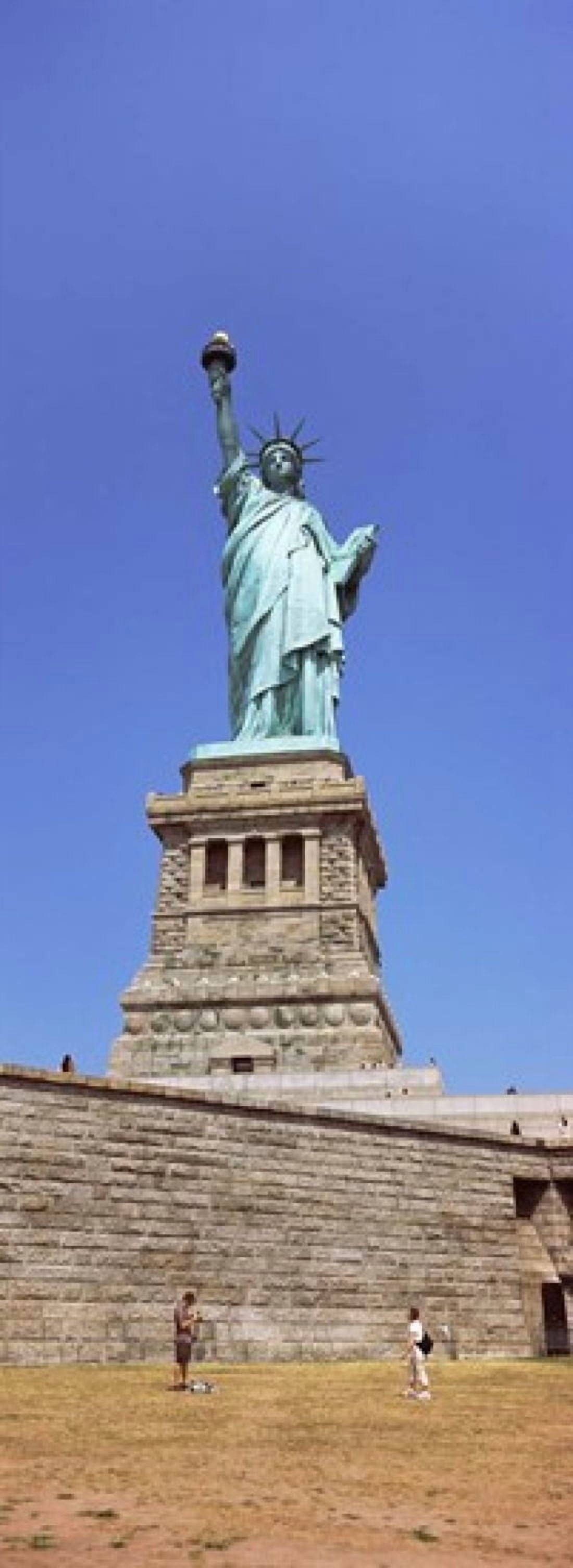 Low angle view of a statue Statue Of Liberty Liberty Island New York City New York State USA Canvas Art - Panoramic Images (18 x 7)