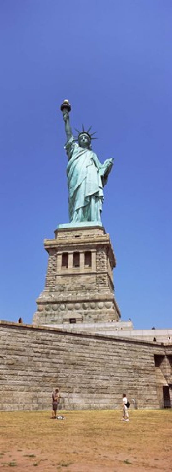 Low angle view of a statue Statue Of Liberty Liberty Island New York City New York State USA Canvas Art - Panoramic Images (36 x 13)
