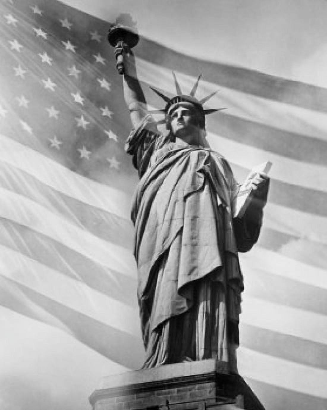 Low angle view of a statue with the American flag in the background Statue of Liberty New York City New York USA Canvas Art - (18 x 24)