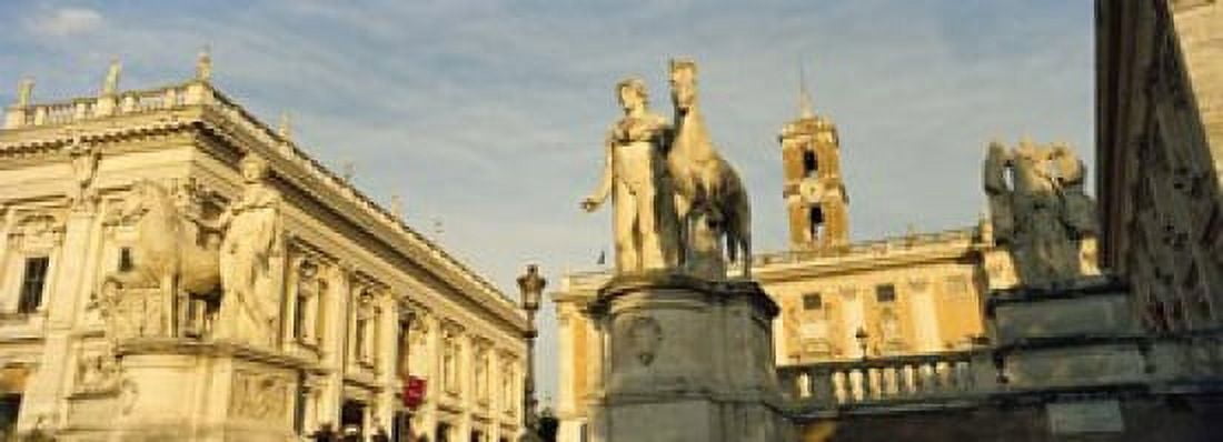 Low angle view of a statues in front of a building Piazza Del Campidoglio Palazzo Senatorio Rome Italy Canvas Art - Panoramic Images (18 x 7)