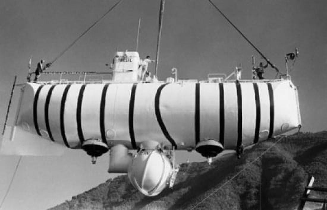 Low angle view of a submarine being lowered in a sea Bathyscaphe Trieste Canvas Art - (24 x 36)
