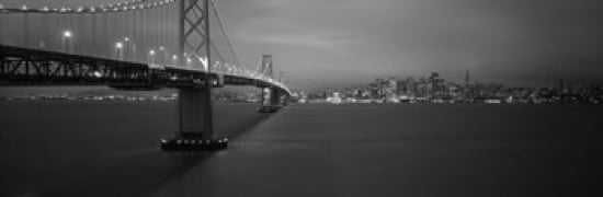 Low angle view of a suspension bridge lit up at night Bay Bridge San Francisco California USA Canvas Art - Panoramic Images (36 x 12)