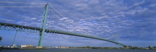 Low angle view of a suspension bridge over the river Ambassador Bridge Detroit River Detroit Michigan USA Canvas Art - Panoramic Images (36 x 12)
