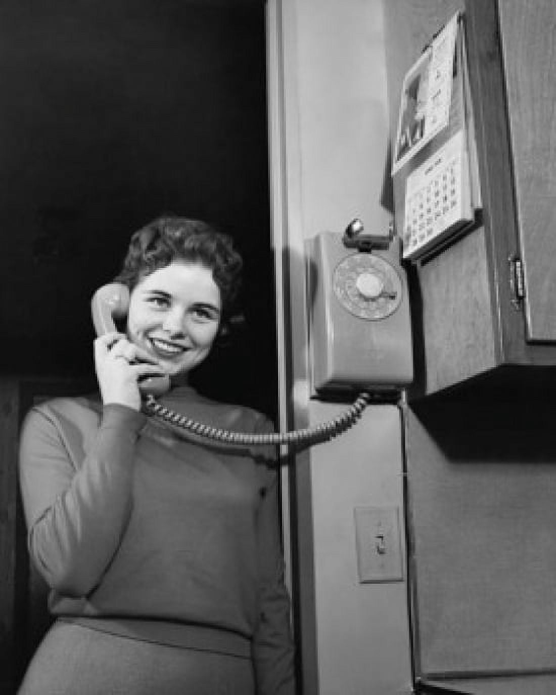 Low angle view of a teenage girl talking on the telephone Canvas Art -  (18 x 24)
