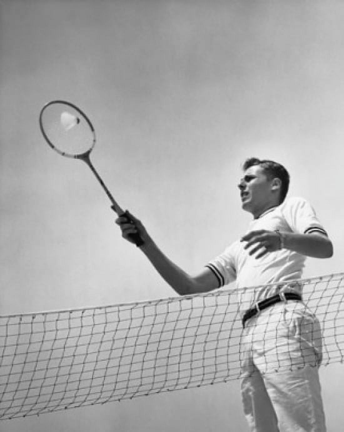 Low angle view of a young man playing badminton Canvas Art - (18 x 24)