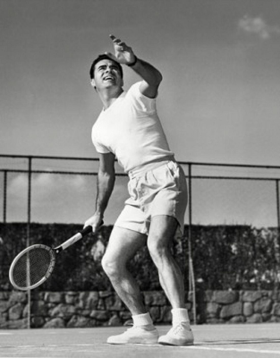 Low angle view of a young man playing tennis on a court Canvas Art - (18 x 24)
