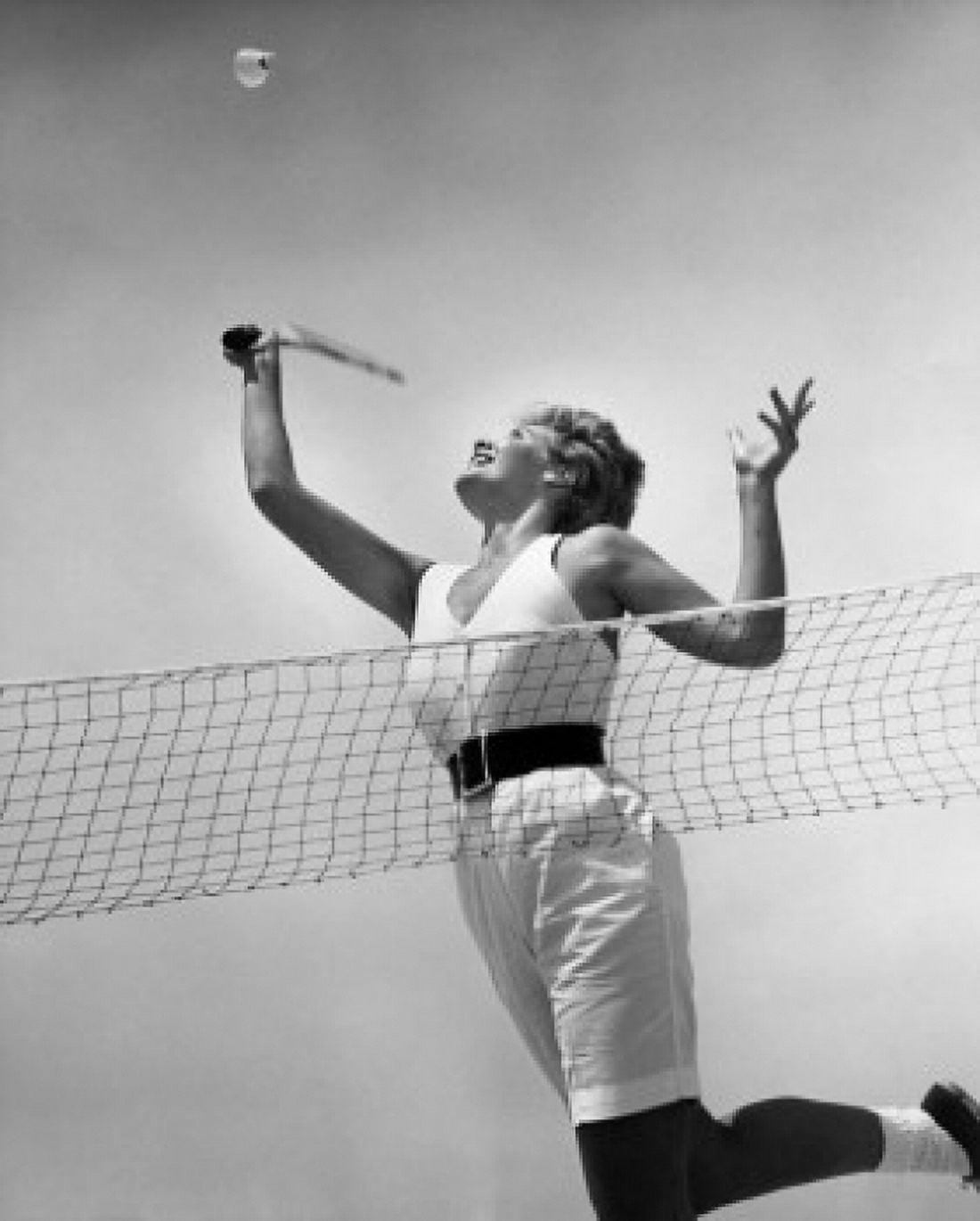 Low angle view of a young woman playing badminton Canvas Art - (18 x 24)