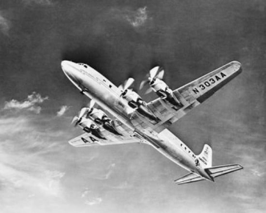 Low angle view of an Douglas DC-7 airplane flying in the sky Canvas Art - (18 x 24)