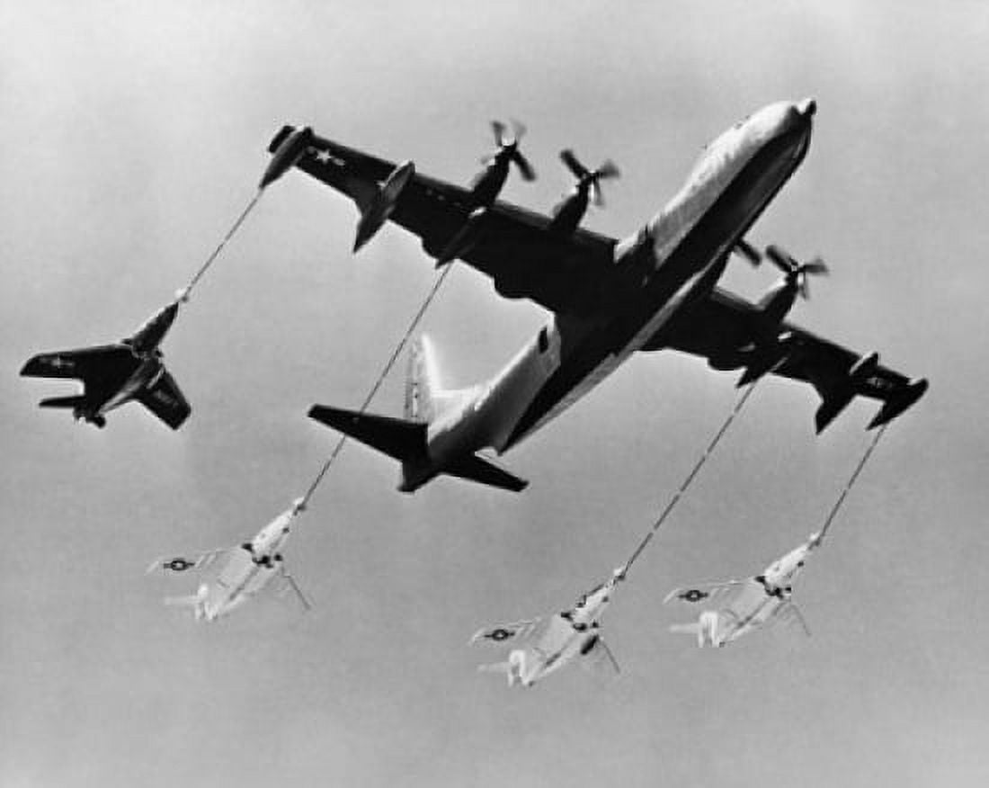 Low angle view of an aircraft refueling four fighter planes R3Y-2 Tradewind Canvas Art - (18 x 24)