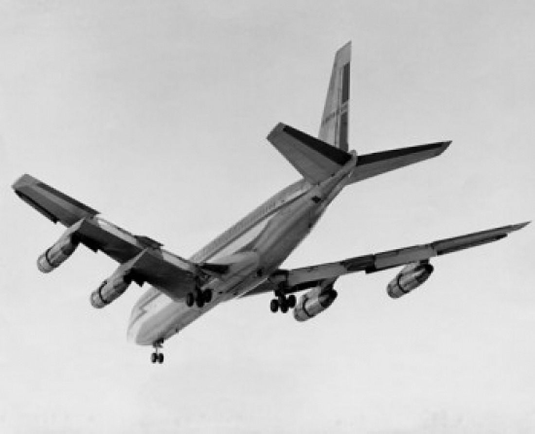 Low angle view of an airplane flying in the sky Canvas Art - (18 x 24)