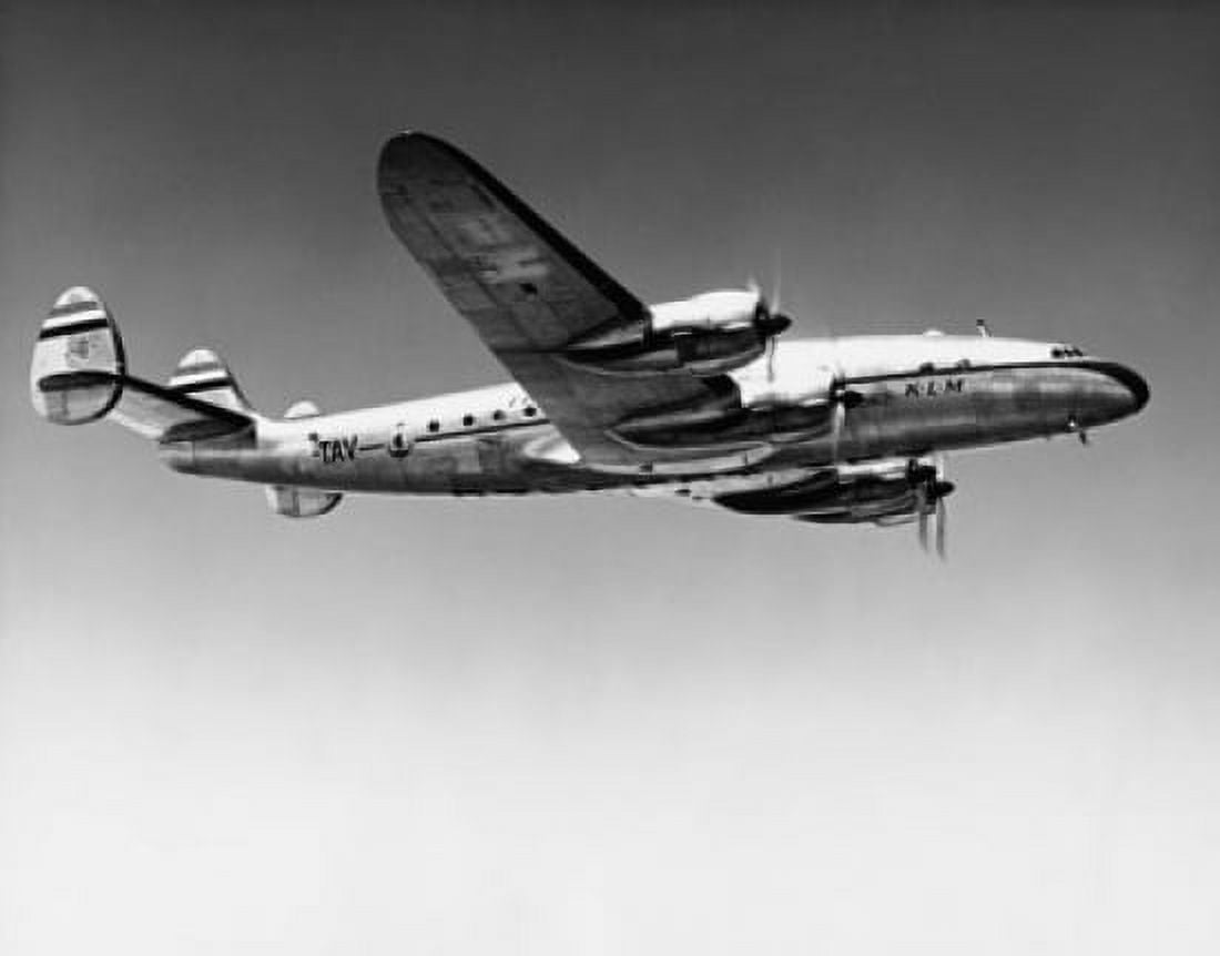 Low angle view of an airplane in flight Canvas Art - (18 x 24)