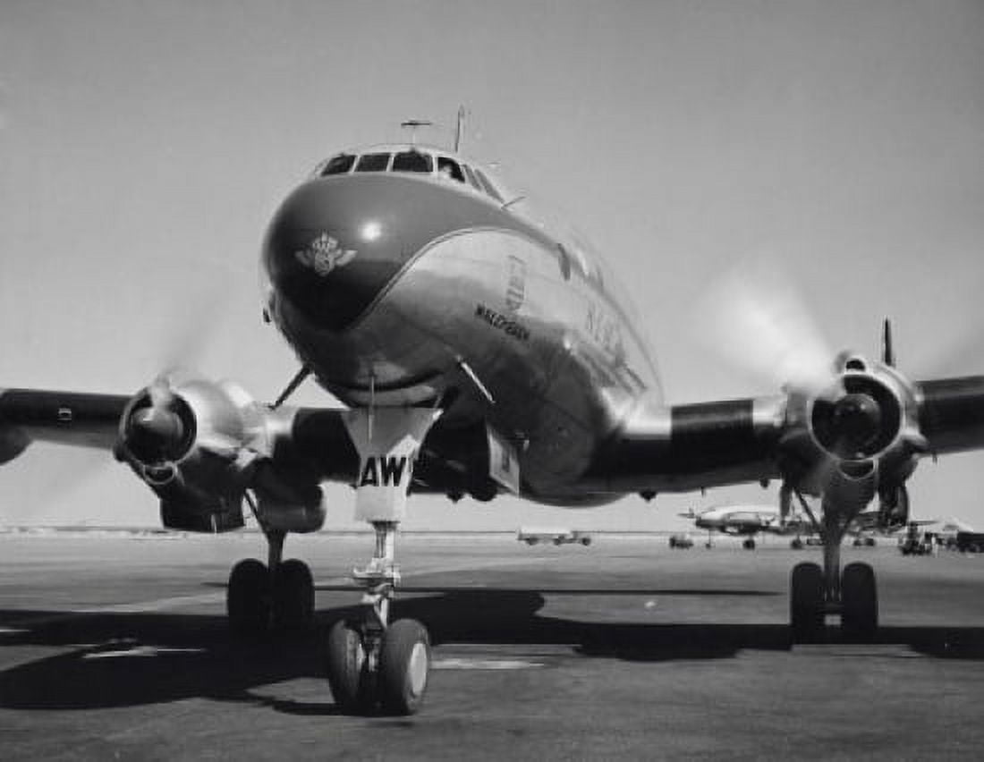 Low angle view of an airplane on a runway Canvas Art - (18 x 24)