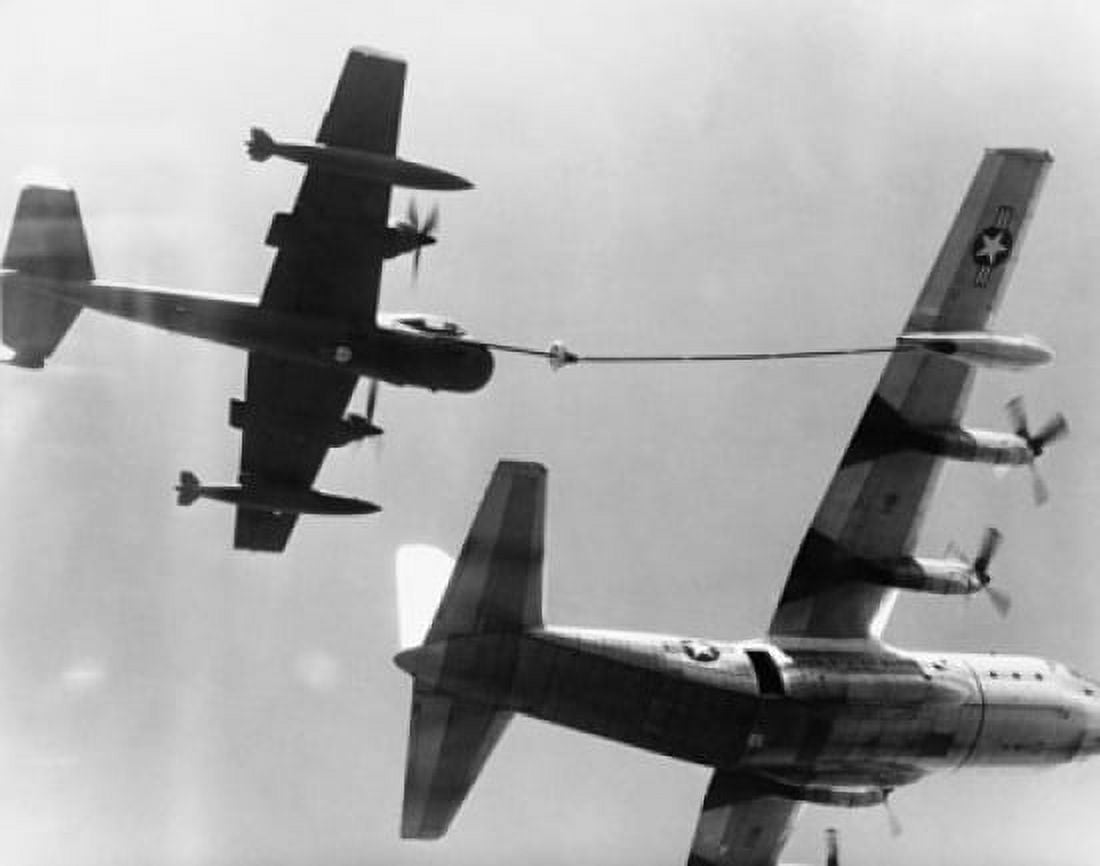 Low angle view of an army Mohawk plane being refueled by US Marine Corps plane Canvas Art -  (24 x 36)