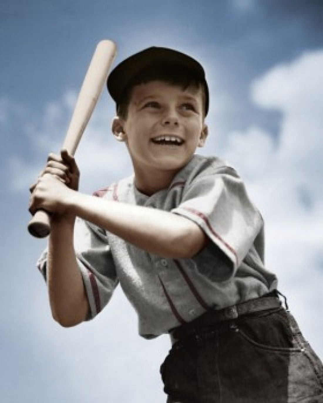 Low angle view of boy swinging baseball bat Canvas Art - (18 x 24)