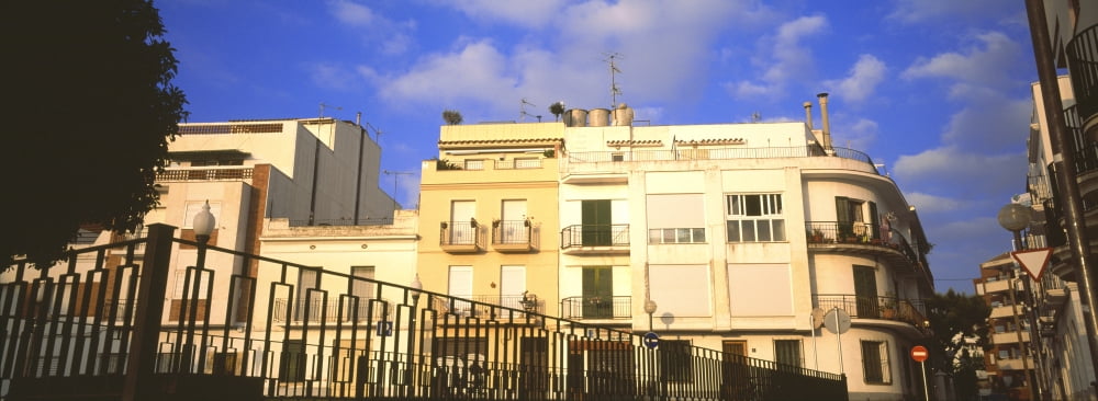Low angle view of buildings Sitges Barcelona Catalonia Spain Canvas Art - Panoramic Images (27 x 9)