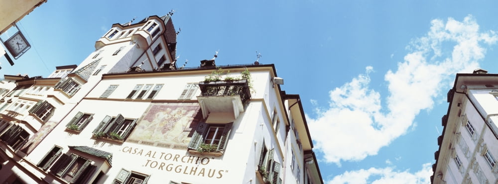 Low angle view of buildings in a city Bolzano Trentino-Alto Adige Italy Canvas Art - Panoramic Images (36 x 12)