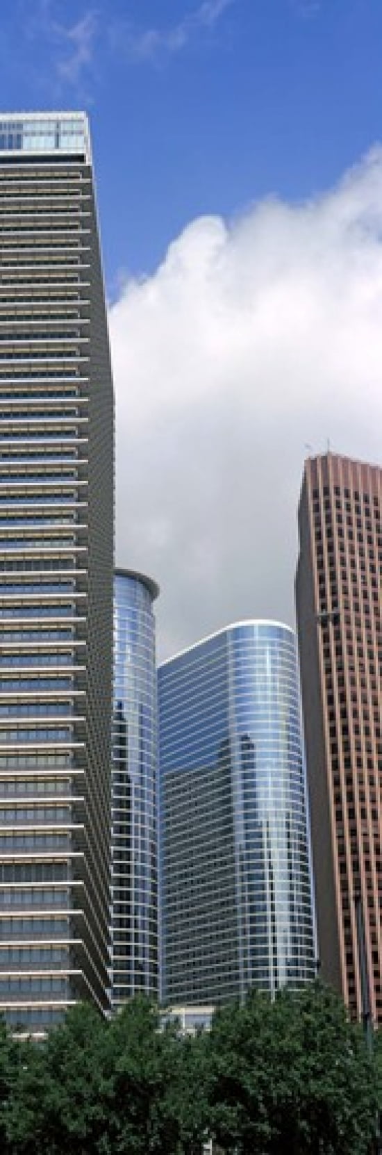 Low angle view of buildings in a city Wedge Tower ExxonMobil Building Chevron Building Houston Texas USA Canvas Art - Panoramic Images (18 x 6)