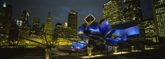 Low angle view of buildings lit up at night Pritzker Pavilion Millennium Park Chicago Illinois USA Canvas Art - Panoramic Images (36 x 13)