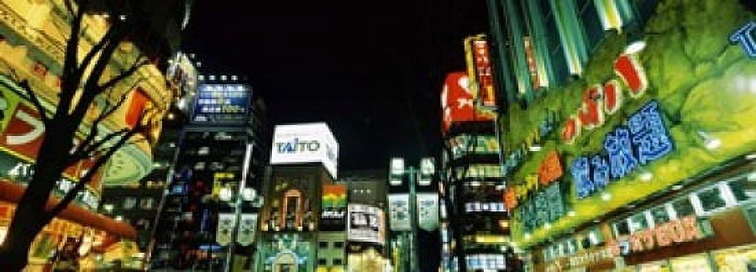 Low angle view of buildings lit up at night Shinjuku Ward Tokyo Prefecture Kanto Region Japan Canvas Art - Panoramic Images (18 x 7)