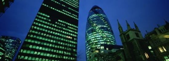Low angle view of buildings lit up at night Sir Norman Foster Building Swiss Re Tower London England Canvas Art - Panoramic Images (36 x 13)