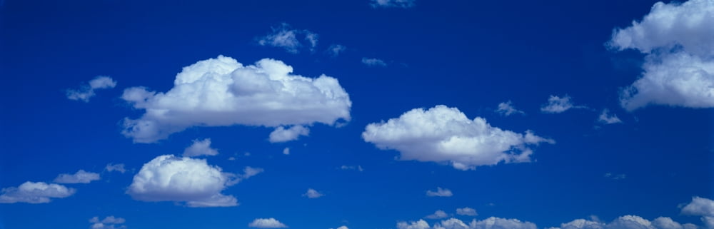 Low angle view of clouds in the blue sky White Sands New Mexico USA Canvas Art - Panoramic Images (6 x 18)