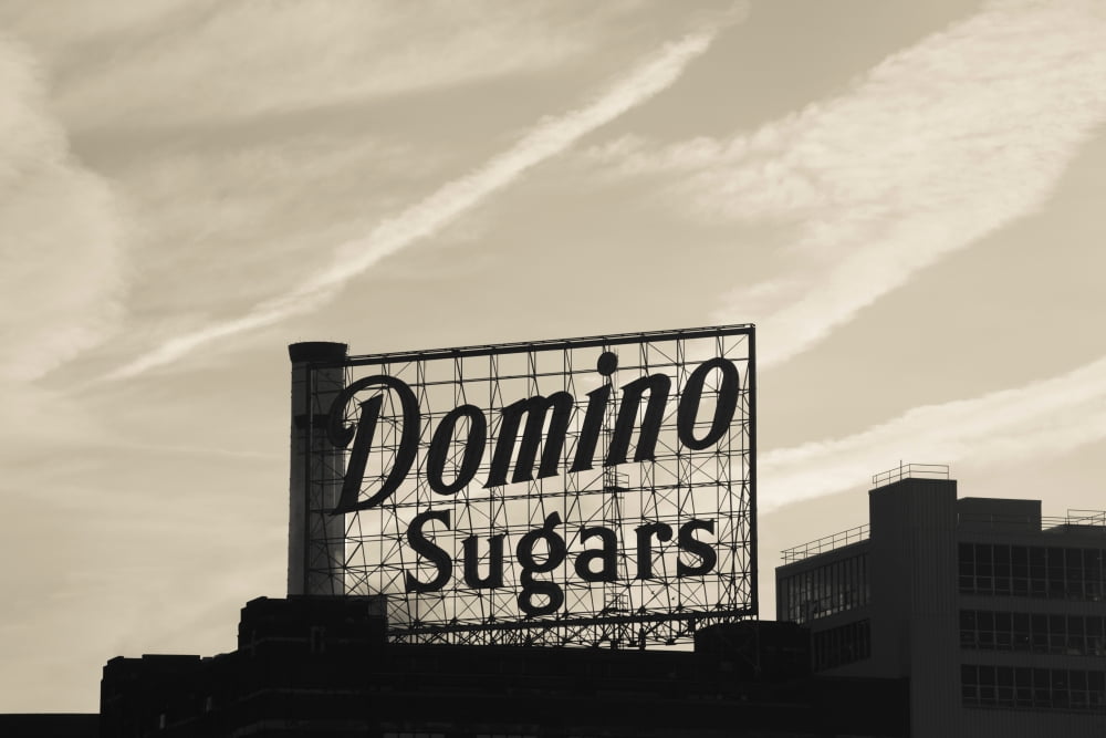 Low angle view of domino sugar sign Inner Harbor Baltimore Maryland USA Canvas Art - Panoramic Images (36 x 12)