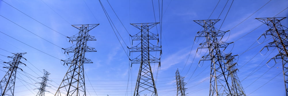 Low angle view of electricity pylons Canvas Art - Panoramic Images (27 x 9)
