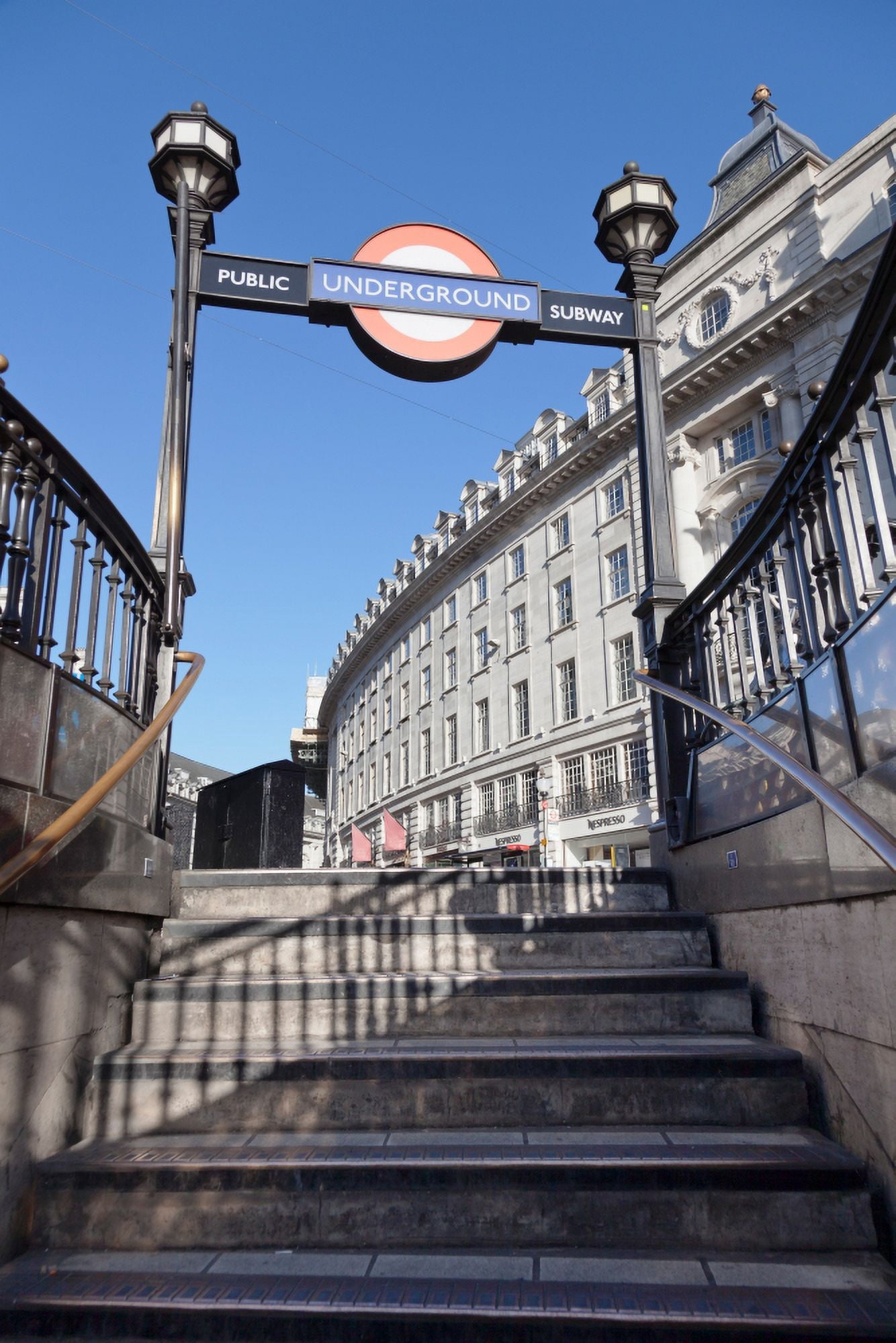 Low angle view of entrance of subway station Piccadilly Circus City of Westminster London England Canvas Art - Panoramic Images (27 x 9)