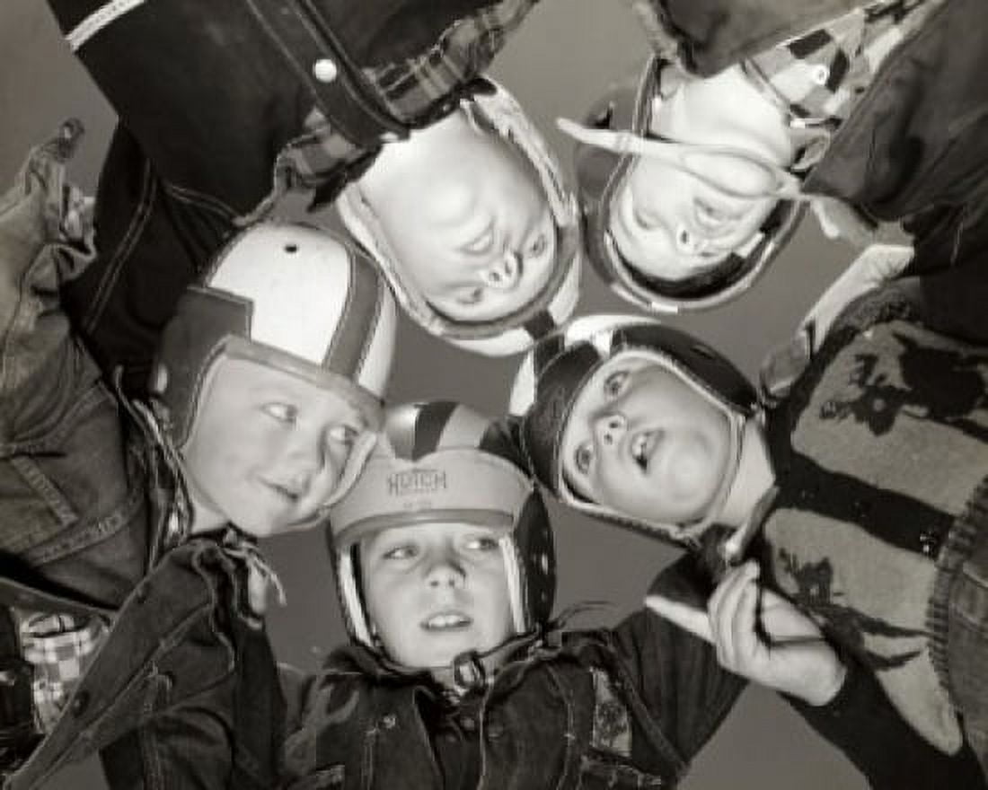 Low angle view of five football players in a huddle Canvas Art - (24 x 36)