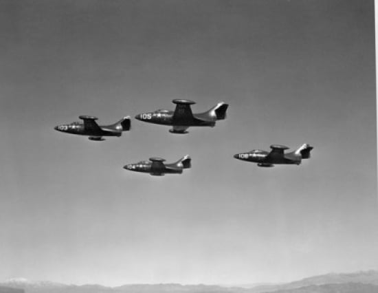 Low angle view of four fighter planes flying in formation F9F Panther Canvas Art - (18 x 24)
