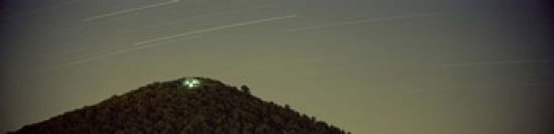 Low angle view of star trails over a mountain peak Echo Mountain Piediluco Lake Terni Umbria Italy Canvas Art - Panoramic Images (20 x 5)