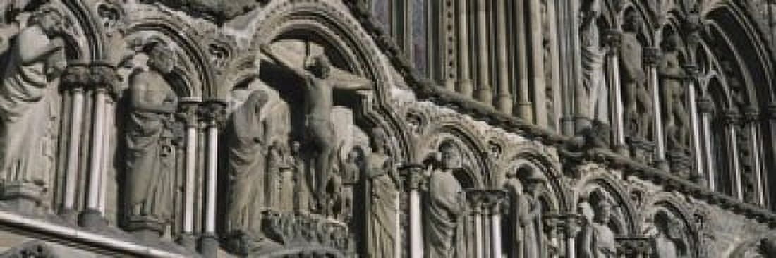 Low angle view of statues carved on wall of a cathedral Trondheim Norway Canvas Art - Panoramic Images (18 x 6)