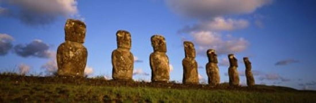 Low angle view of statues in a row Moai Statue Easter Island Chile Canvas Art - Panoramic Images (18 x 6)